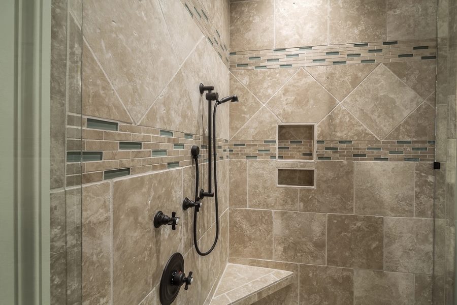 Tiled bathroom wet zone with shower area prepared for waterproofing